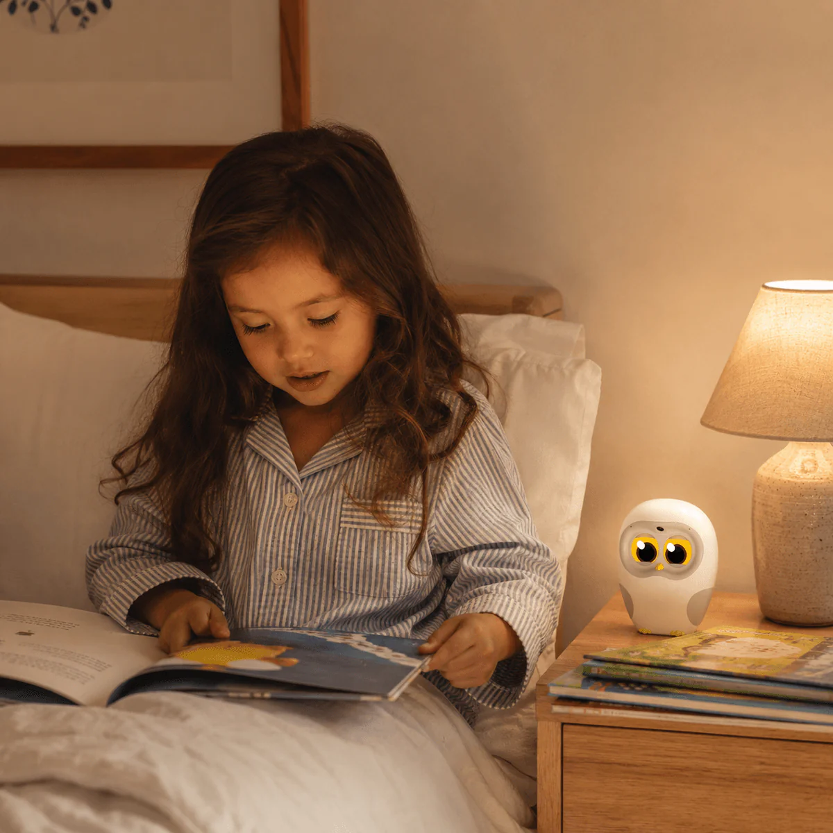 Miguel's daughter reading in bed with Luka